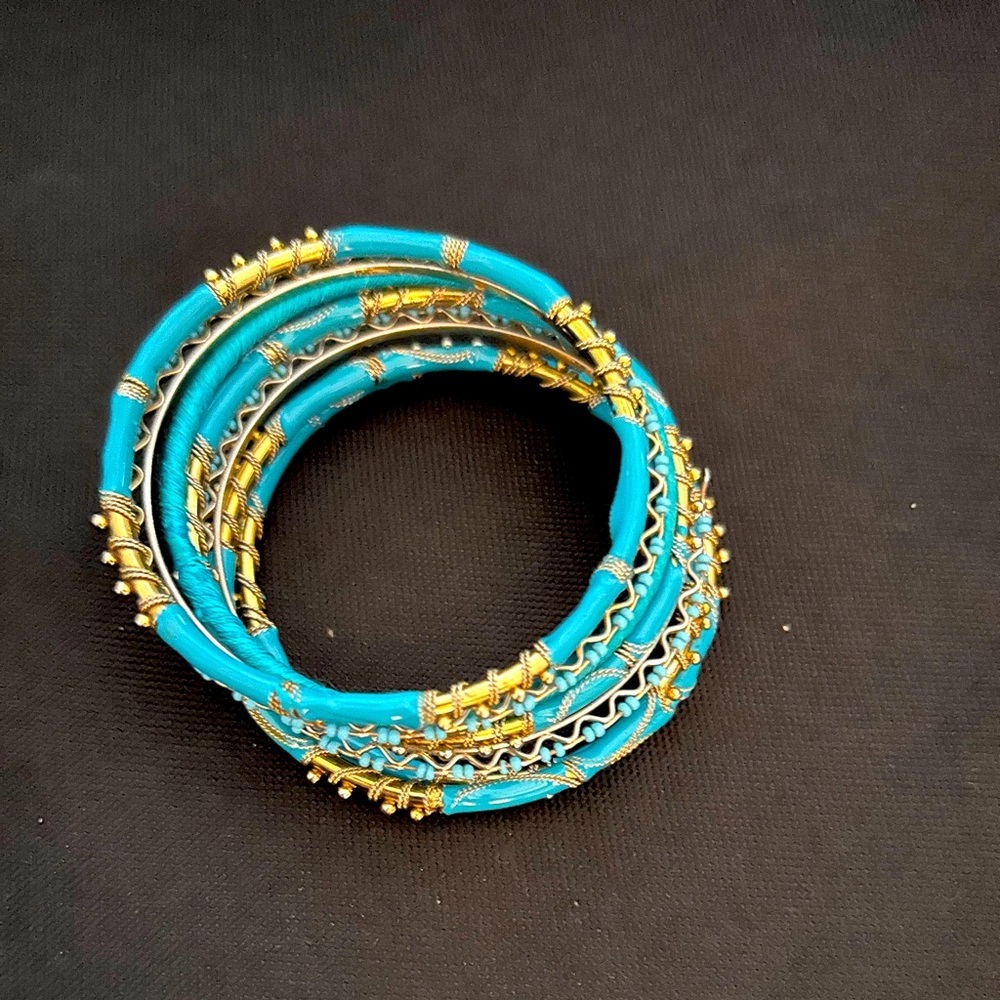 Turquoise and gold bracelets 7 each stack